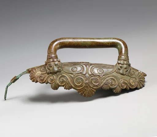 Two bronze handles