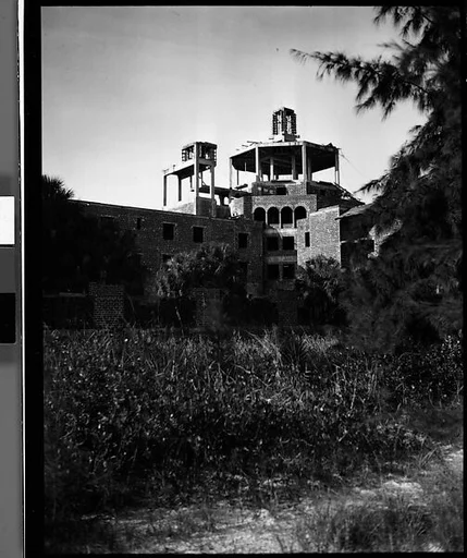 [Tower Construction of Unfinished Italianate Revival Hotel on Coast, Florida]