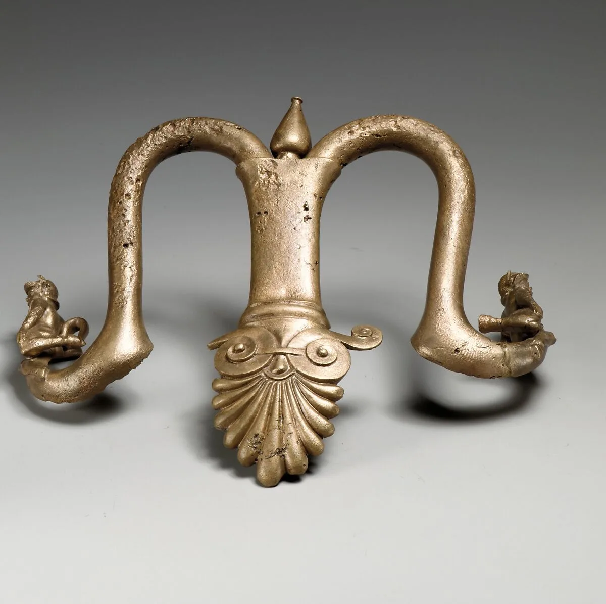 Handles and feet of a bronze louterion (basin) — Unknown