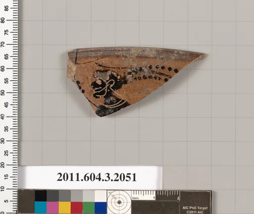 Terracotta rim fragment of a kylix (drinking cup)