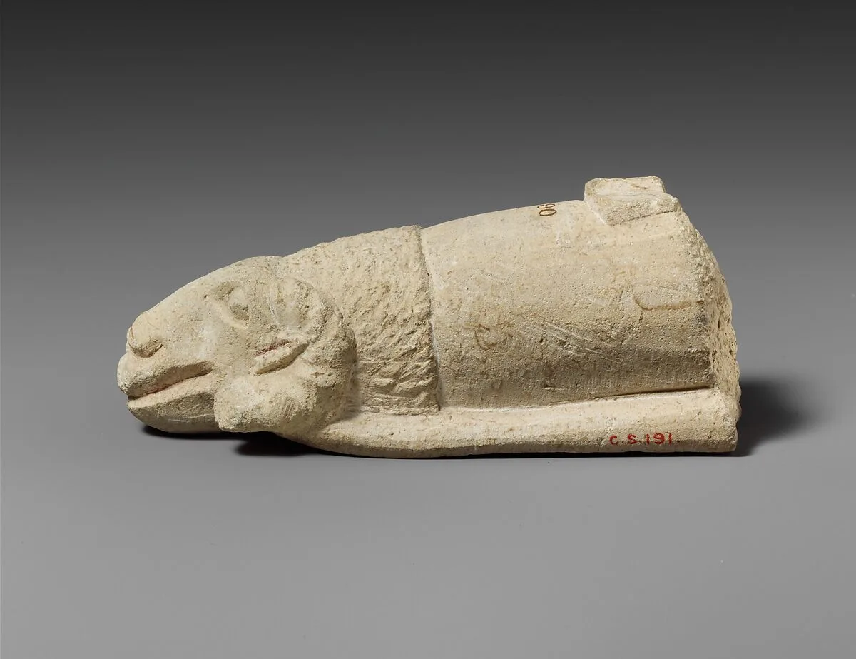 Limestone handle of a patera or a fire shovel ending in a ram’s head — Unknown