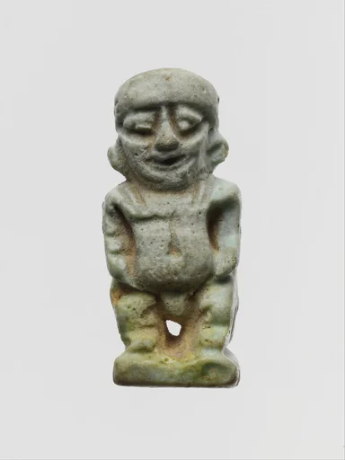 Faience two-sided amulet in the form of the dwarf god Pataikos