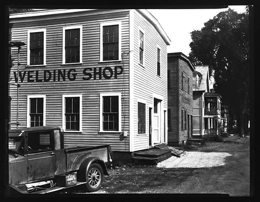 [Parked Car in Front of Leveille's Welding Shop, Near Boston, Massachusetts]