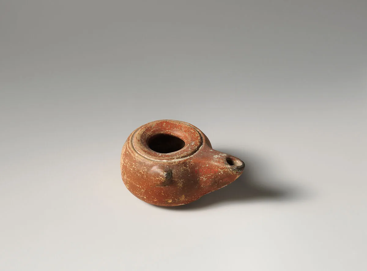 Terracotta oil lamp — Unknown
