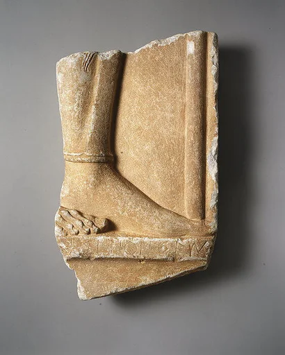 Fragmentary marble grave stele of a hoplite (foot soldier)