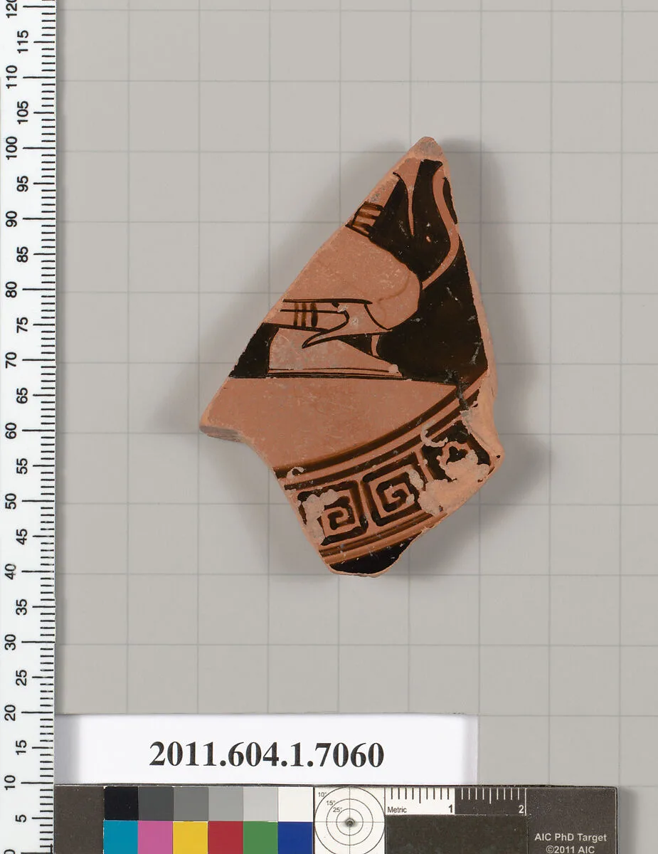 Terracotta fragment of a kylix (drinking cup) — Douris