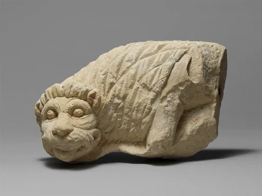 Limestone statue of a lion
