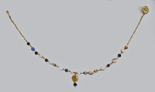 Gold, pearl, and glass necklace