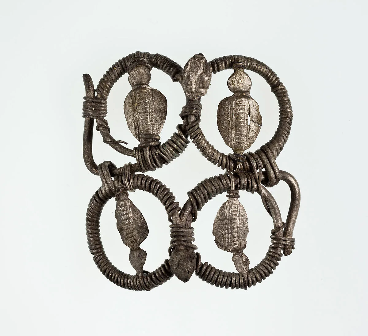 Part (?) of a bracelet or armlet with uraei — Unknown
