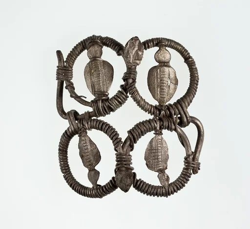 Part (?) of a bracelet or armlet with uraei