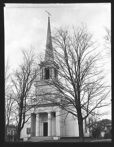 [Greek Revival Church Behind Trees and Power Lines]