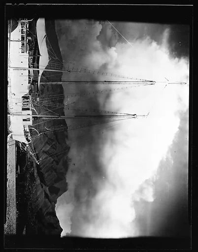 [South Seas: Double-Masted Boat Near Shoreline]