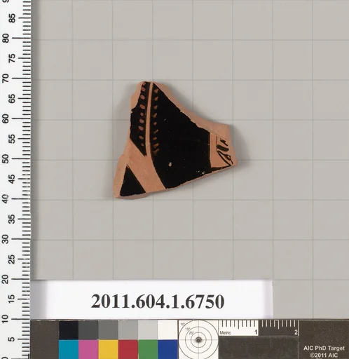 Terracotta fragment of a kylix (drinking cup)