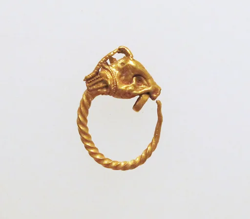 Gold earring with head of a goat