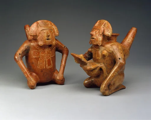 Pair of Figure Vessels