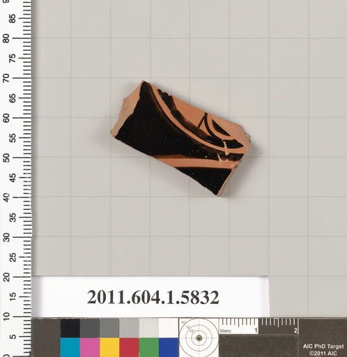 Terracotta fragment of a kylix: eye-cup (drinking cup)