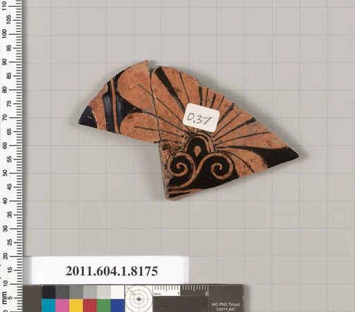 Terracotta fragment of a kylix (drinking cup)