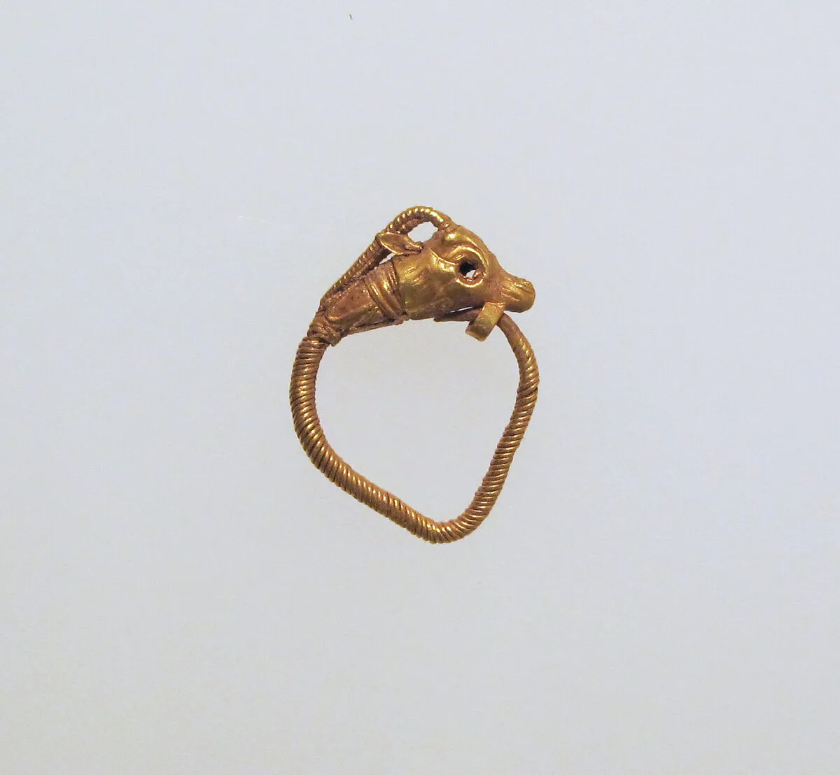 Gold earring with head of a goat — Unknown