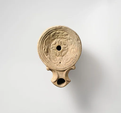 Terracotta oil lamp
