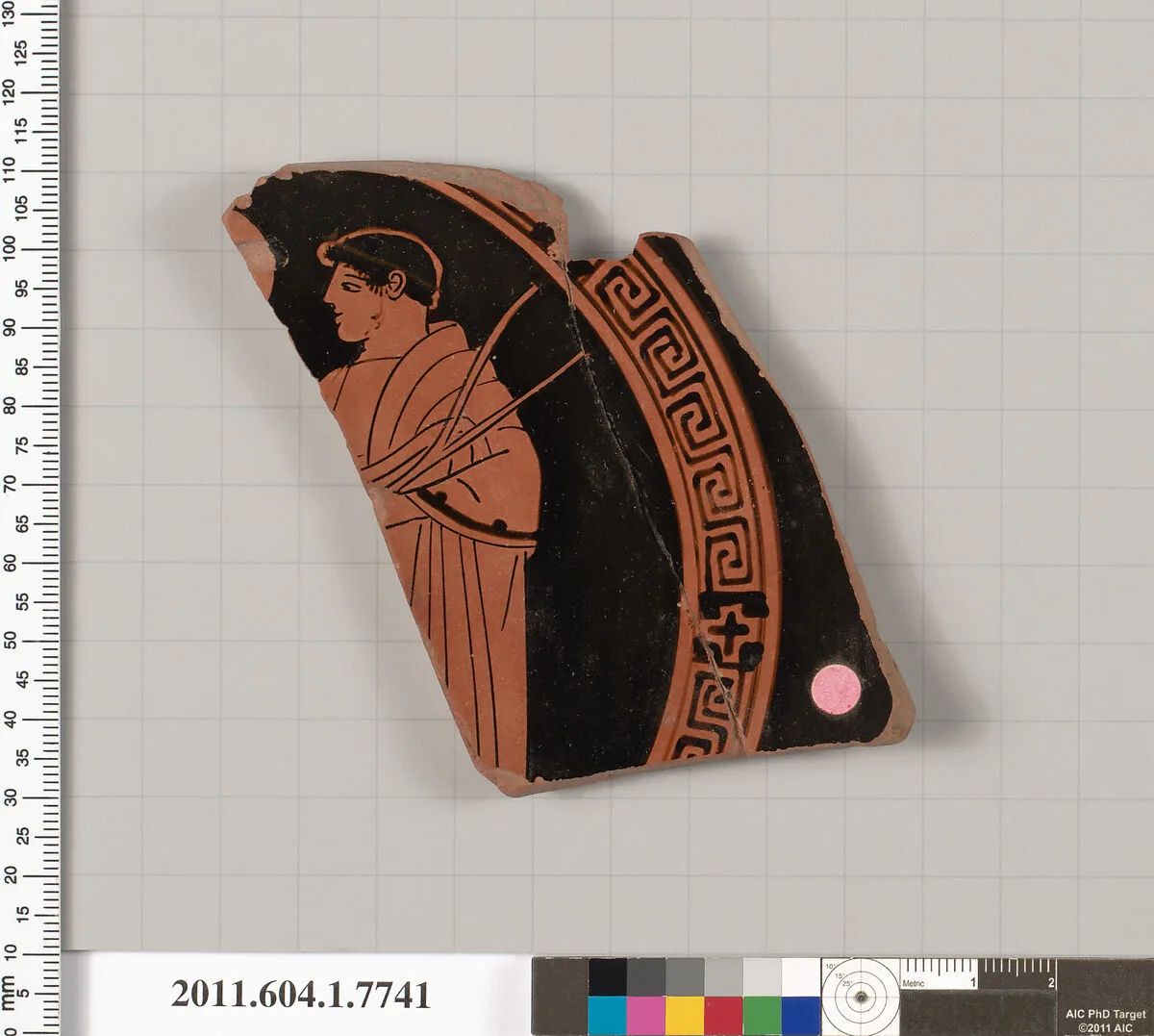 Terracotta fragment of a kylix (drinking cup) — Boot Painter