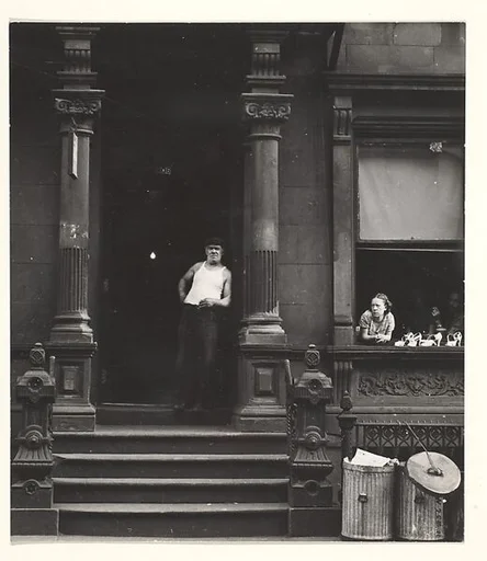 [Man in Undershirt Standing in Doorway, Woman Leaning on Window Sill, 406 West 25th Street, New York]