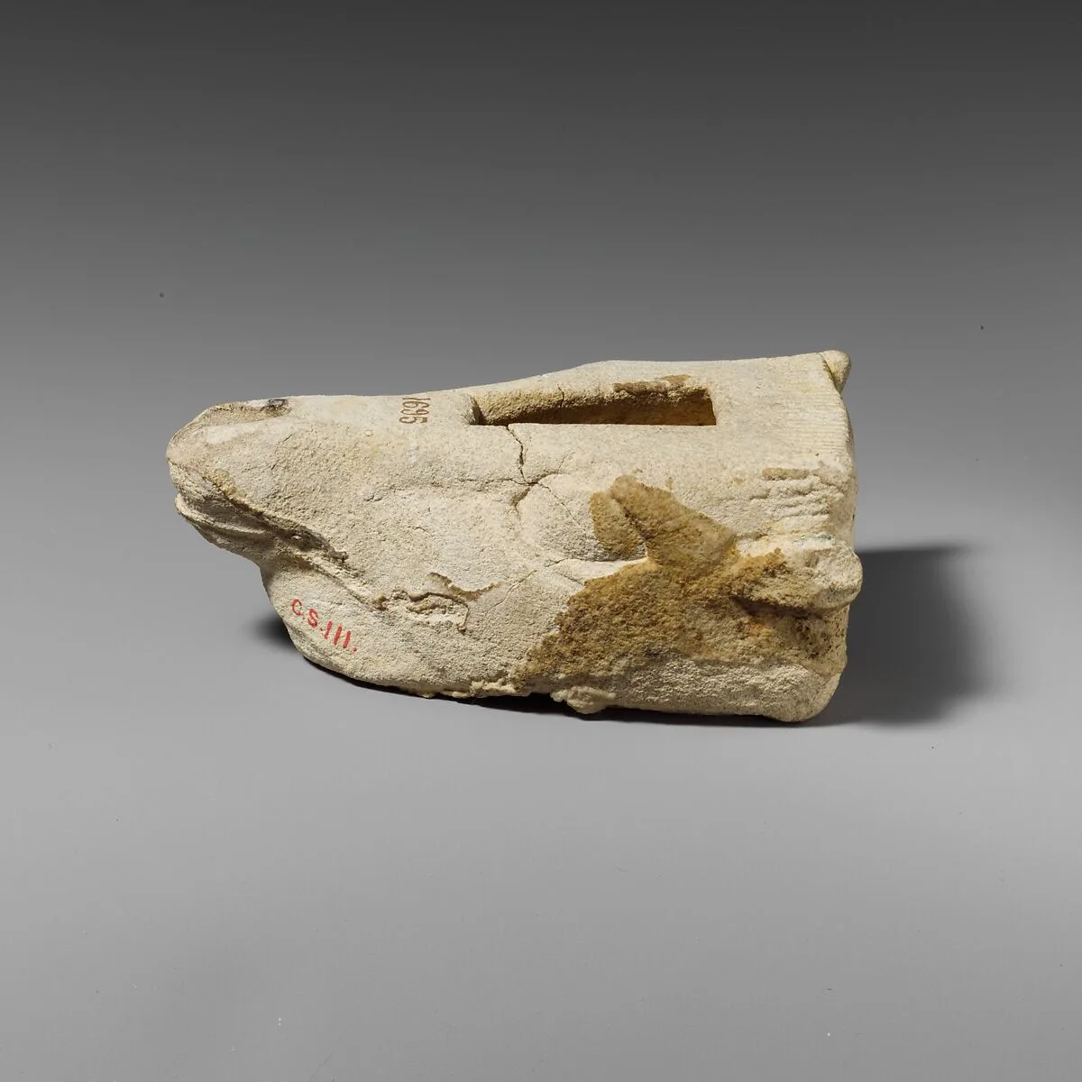 Limestone lamp in the shape of a bull’s head — Unknown