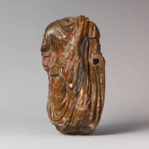 Jasper statuette of a man wearing a toga