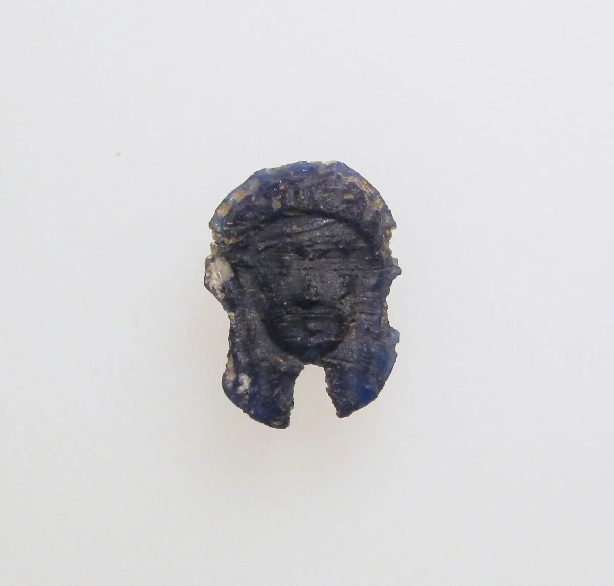 Glass double-headed pendant — Unknown