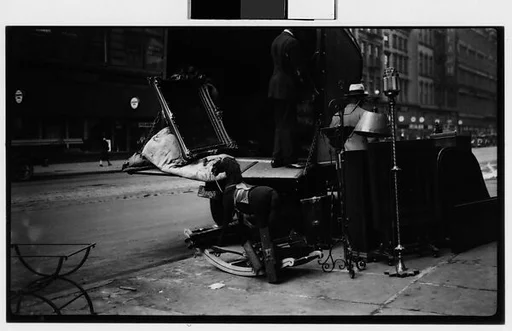 [Moving Truck on Street with Mirror, Hobby Horse, and Lamp on Sidewalk, New York City]