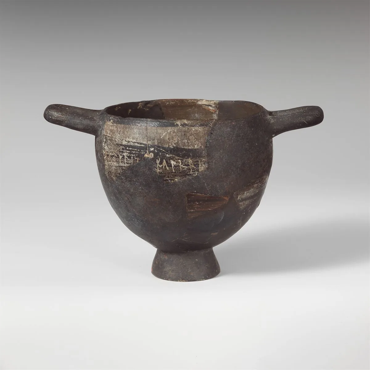 Fragment of a terracotta skyphos (deep drinking cup) — Unknown