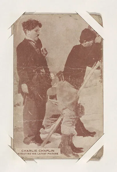 Charlie Chaplin directing his latest picture from Movie Stars Exhibit Cards series (W401) — Unknown