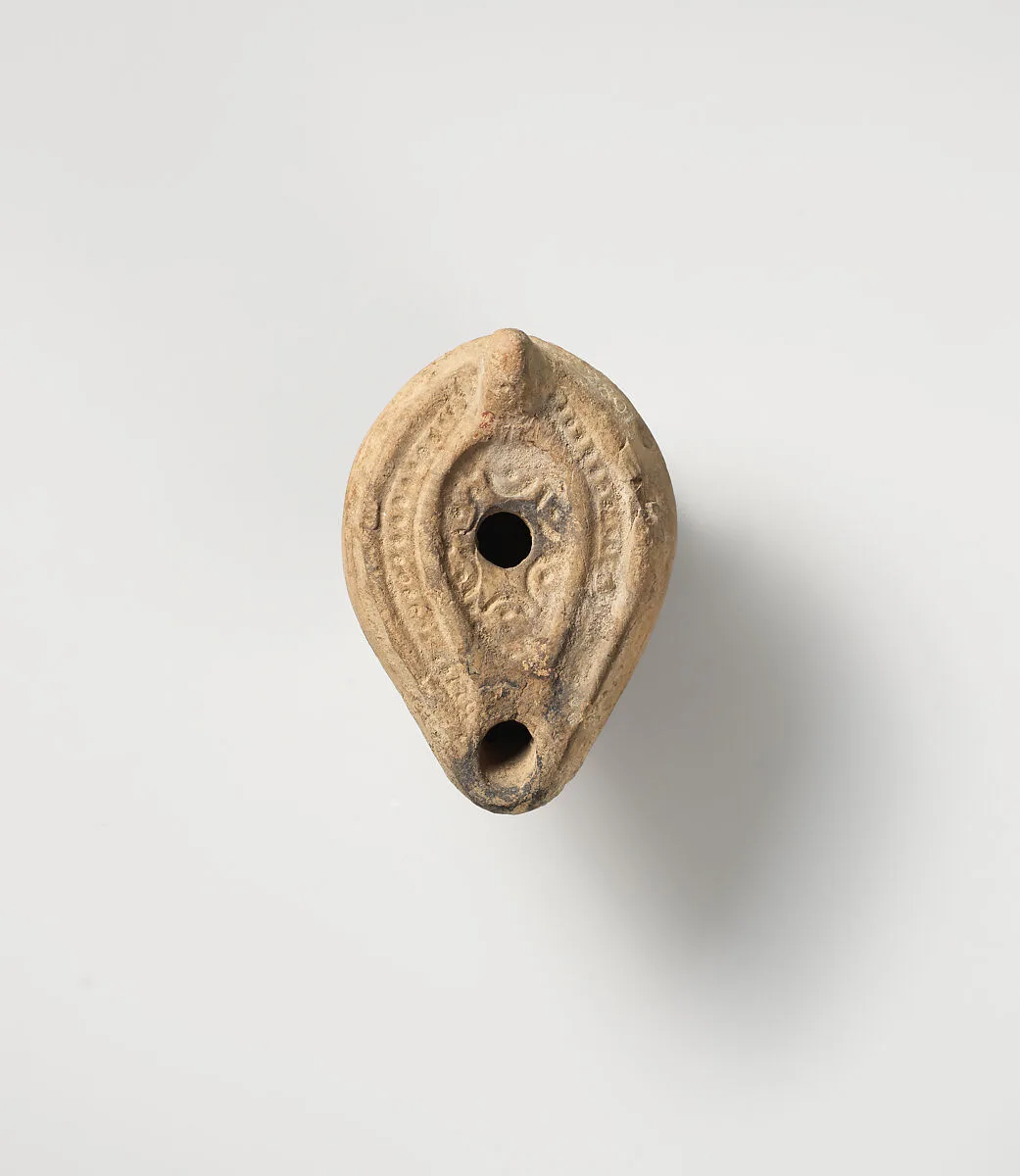 Terracotta oil lamp — Unknown