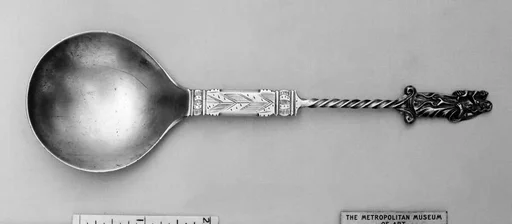 Figure-top spoon