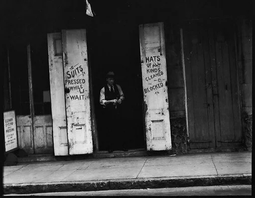 [Signs Around Laundry Doorway, New Orleans, Louisiana]