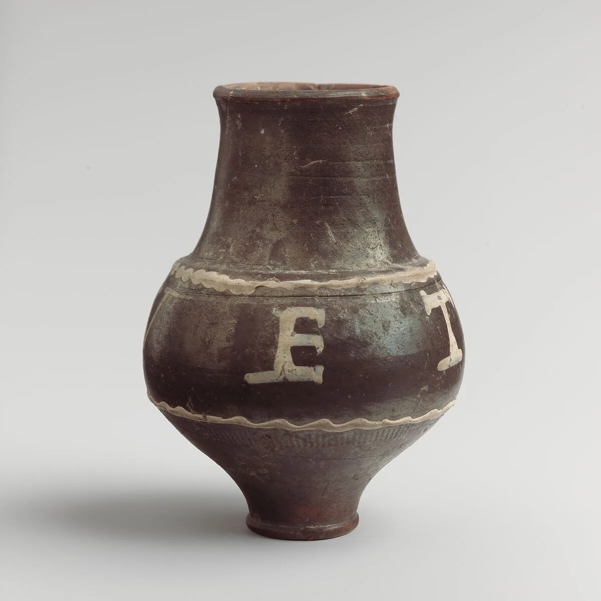 Terracotta beaker with painted inscription — Unknown