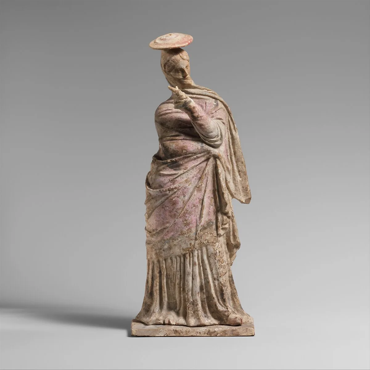 Terracotta statuette of a woman — Unknown