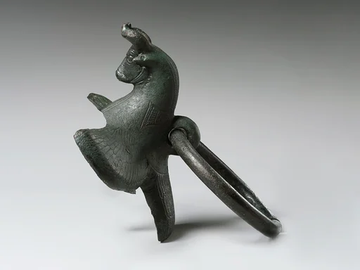 Cauldron attachment: winged bull's head