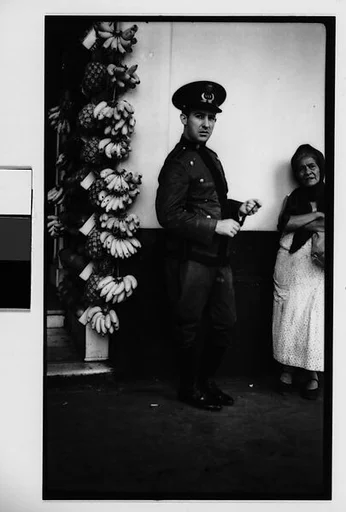 [Policeman and Fruit Vendor on Street, Havana]