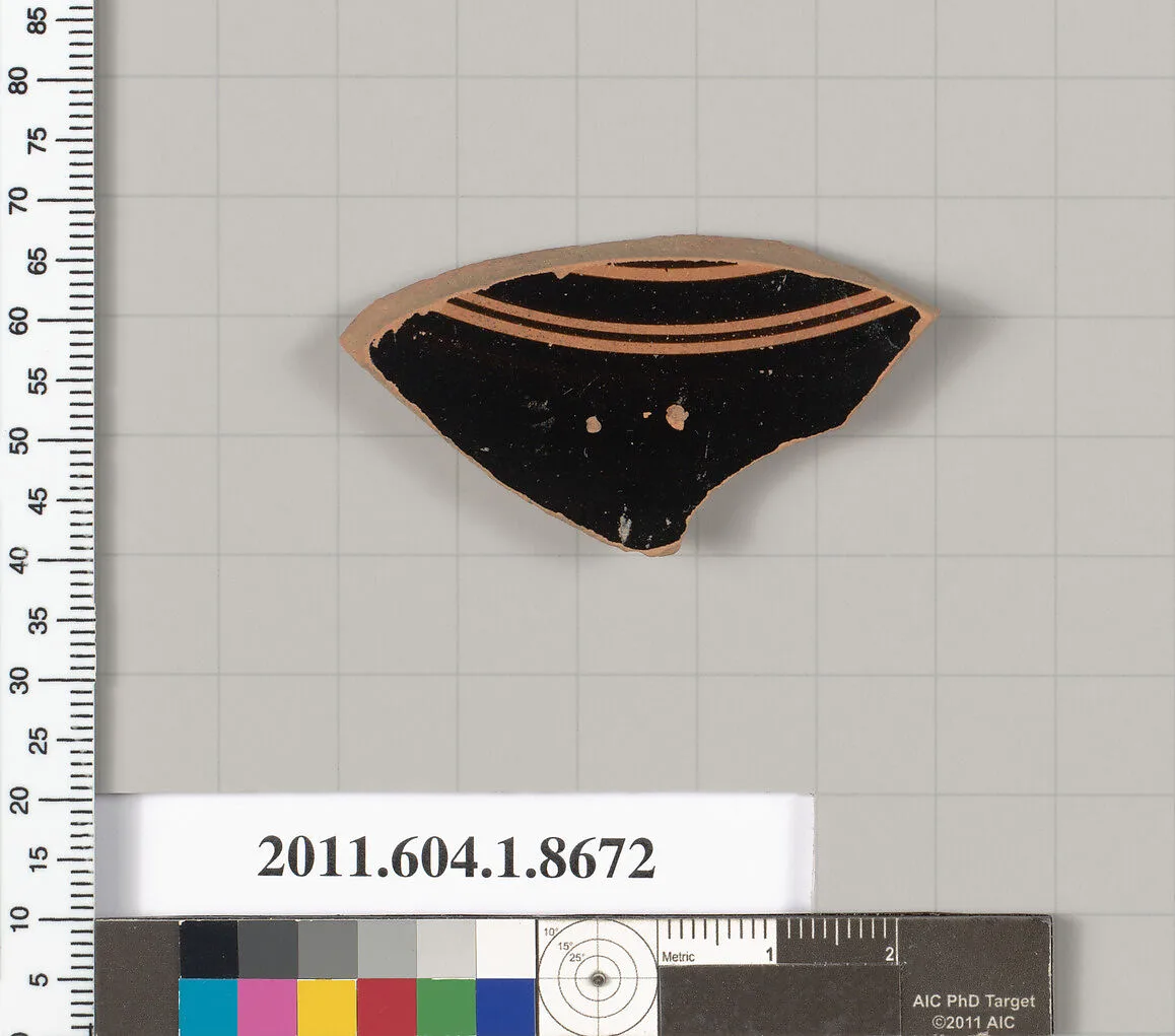 Terracotta fragment of a stemless kylix (drinking cup) — Unknown