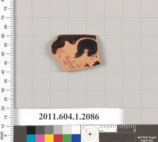 Terracotta rim fragment of a kylix (drinking cup)