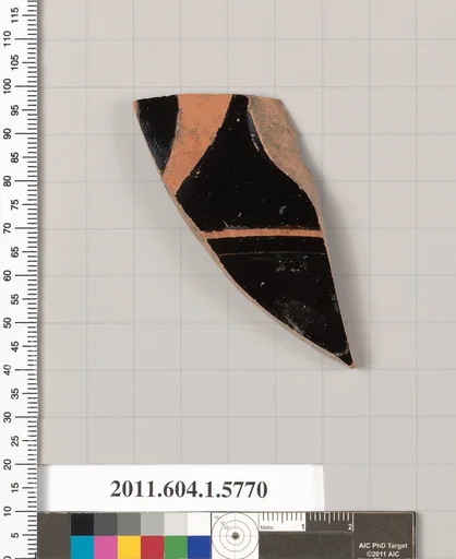 Terracotta fragment of a kylix: eye-cup (drinking cup)