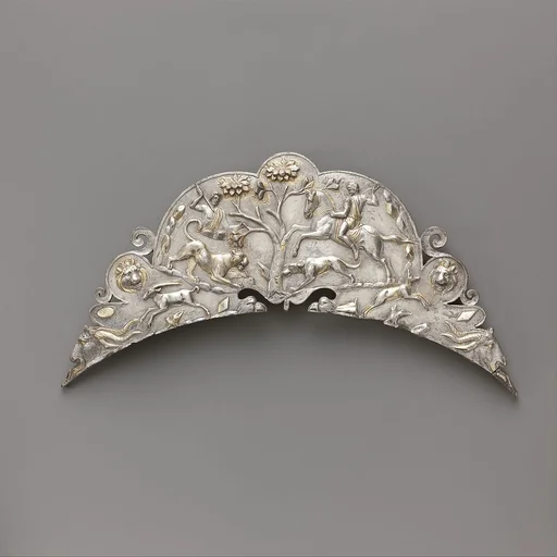 Silver handle of a large dish