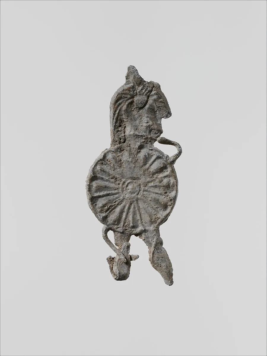 Lead figure of a warrior with a helmet, shield, and spear — Unknown