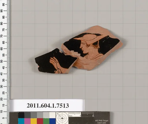 Terracotta fragment of a kylix (drinking cup)