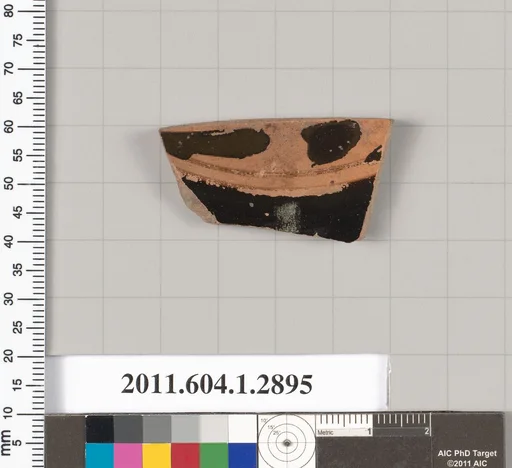 Terracotta fragment of a kylix (drinking cup)