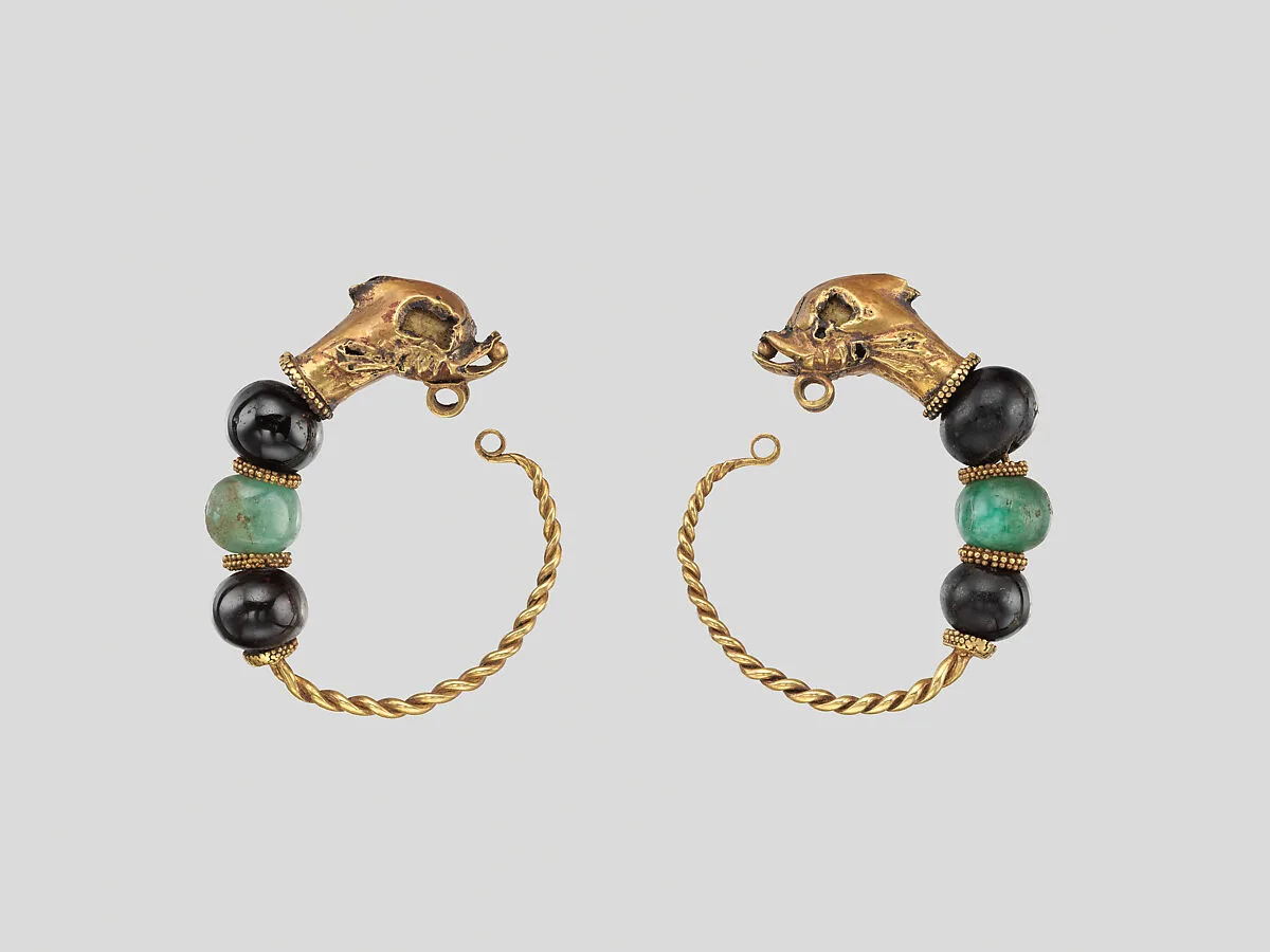 Gold, beryl, and garnet earring with head of a dolphin — Unknown