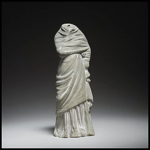 Terracotta statuette of a woman