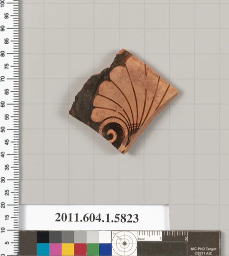 Terracotta fragment of a kylix: eye-cup (drinking cup)