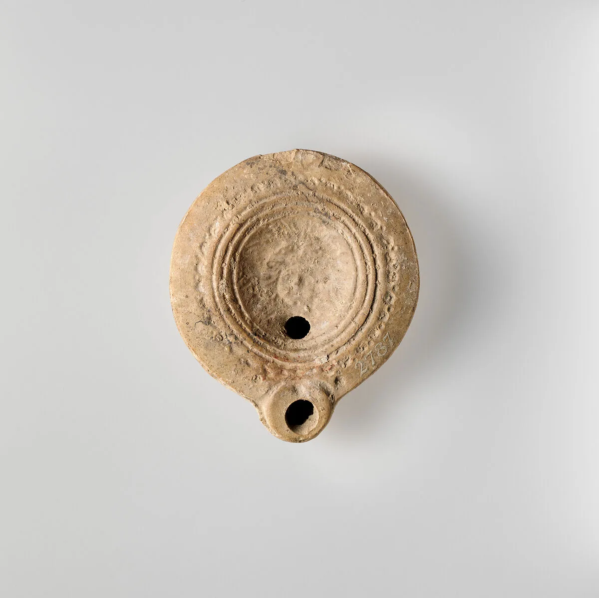 Terracotta oil lamp — Unknown
