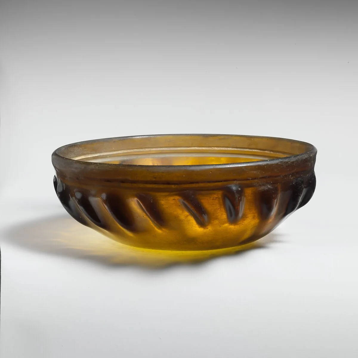 Glass ribbed bowl — Unknown